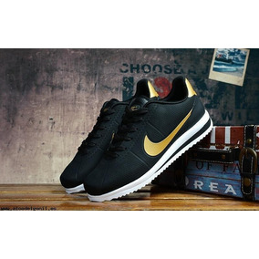 tenis nike mujer negro con dorado